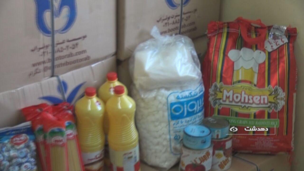 توزیع سبد غذایی بین مددجویان ایتام کمیته امداد شهرستان کهگیلویه